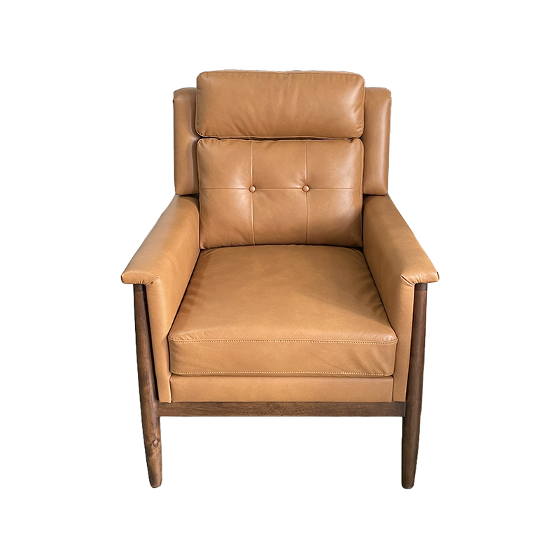 How do the color and texture of leather sofas echo the interior decoration style and shape the atmosphere of the space?